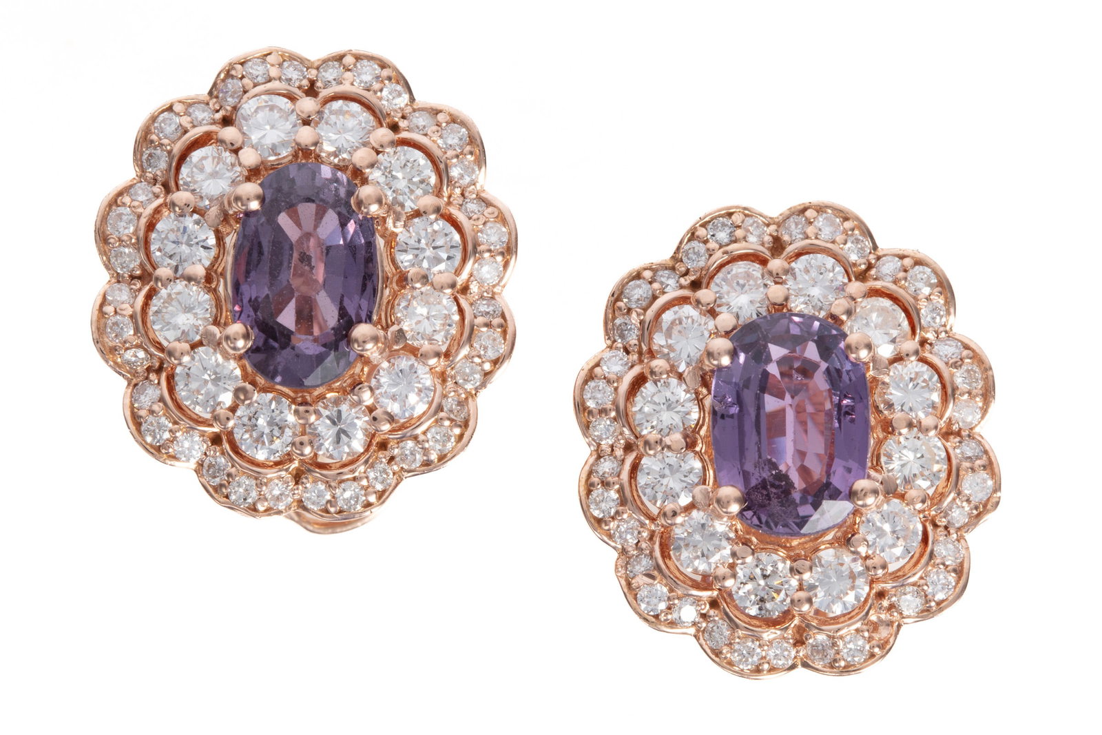 14 kt. Rose Gold, Sapphire and Diamond Earrings: 14 kt. Rose Gold, Sapphire and Diamond Earrings 2 oval brilliant faceted cut purplish pink sapphires, total wt. approx. 3.65 cts.; mounted with 1.89 cts. of round brilliant cut diamonds; l. 3/4 IN.; G