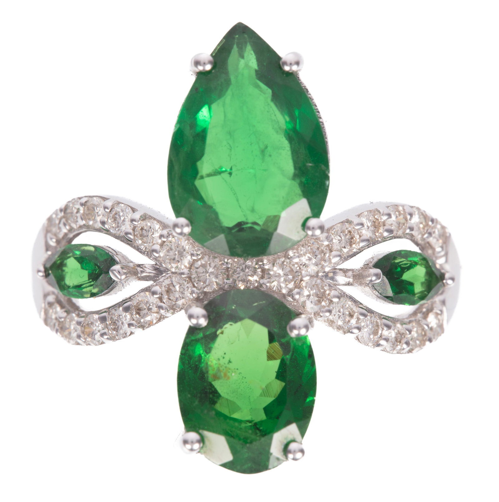 14 kt. White Gold, Tsavorite Garnet and Diamond Ring: 14 kt. White Gold, Tsavorite Garnet and Diamond Ring mounted with pear, oval and 2 marquise shape garnets, total wt. approx. 4.57 cts.; and 0.39 ct. of round brilliant cut diamonds; size 6.75; GGA rep