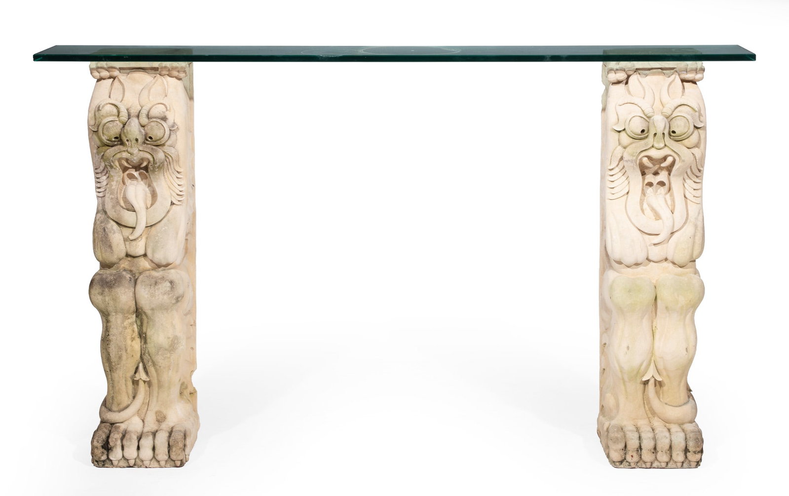 Tiki Totem Carved Stone and Glass Console Table: Tiki Totem Carved Stone and Glass Console Table 1983, one of the bases signed and dated 42 1/2 x 72 x 10 in. (108 x 182.9 x 25.4 cm.)
