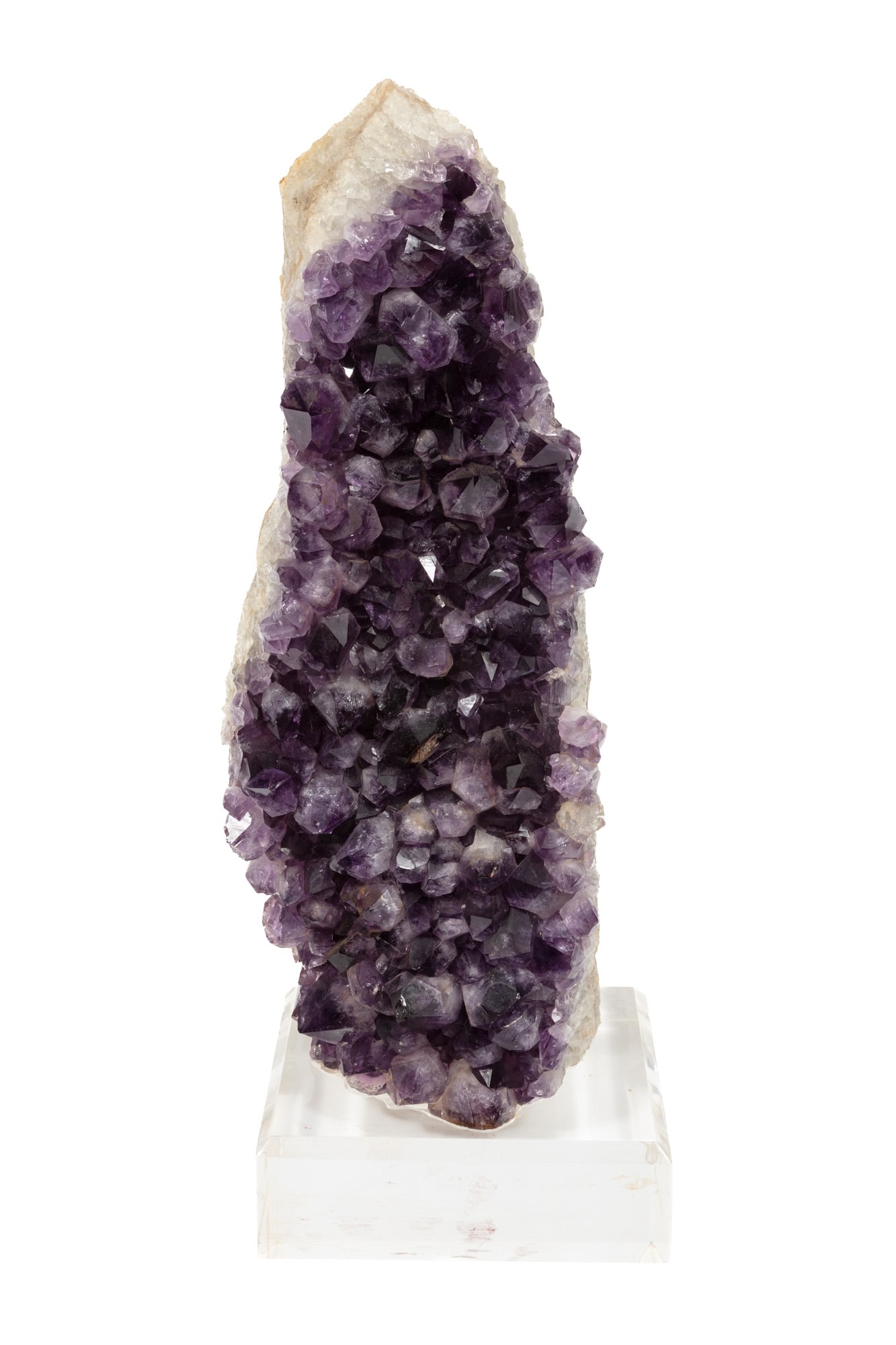 Amethyst Geode: Amethyst Geode presented on acrylic base 17 1/2 x 7 x 5 1/2 in. (44.5 x 17.8 x 14 cm.)