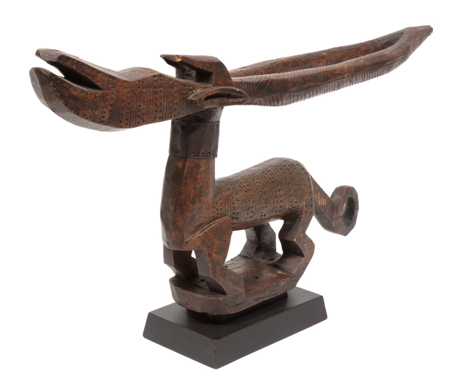 Bamana Chiwara Antelope Headdress: Bamana Chiwara Antelope Headdress on contemporary base 13 x 24 1/2 x 4 1/2 in. (33 x 62.2 x 11.4 cm.)