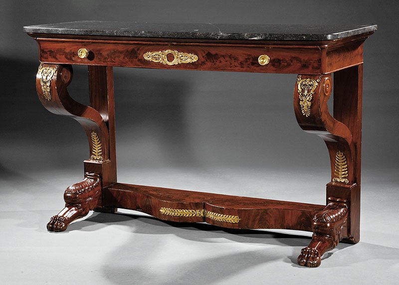 Empire Bronze-Mounted Carved Mahogany Pier Table: An Empire Bronze-Mounted Carved Mahogany Pier Table, 19th c., marble top, molded frieze fitted with a drawer, scrolled supports, shaped stretcher, acanthine paw feet, oak secondary wood, height 36 in.