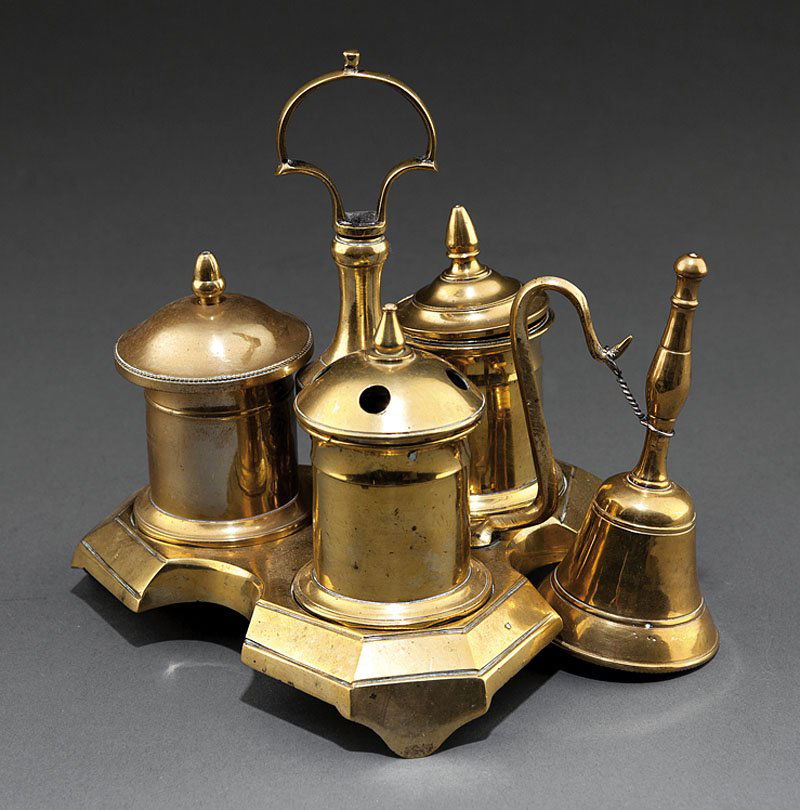 Queen Anne Brass Standish: A Queen Anne Brass Standish, 18th c., tripartite stand with three canisters and associated servant's bell, height 7 1/4 in., width 7 in., depth 7 in Provenance: Ex-Collection of David Stockwell, New Y