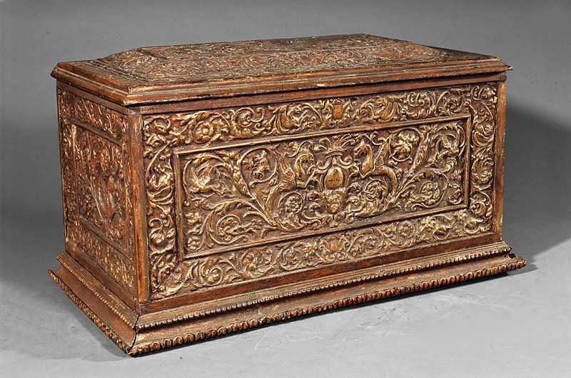 Renaissance-Style Carved and Gilded Coffer: An Italian Renaissance-Style Carved and Gilded Coffer, 18th c., molded hinged lid, void interior with remnants of paint and fabric lining, paneled sides, beaded and lamb's tongue plinth, height 14 3/4