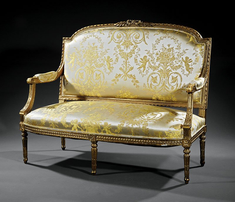 Louis XVI-Style Carved Giltwood Canape: A Louis XVI-Style Carved Giltwood Canape, arched crest, padded arms with acanthus terminals, molded seat rail with rosette blocks, tapered fluted legs, height 43 in., width 54 in., depth 25 in Note: T