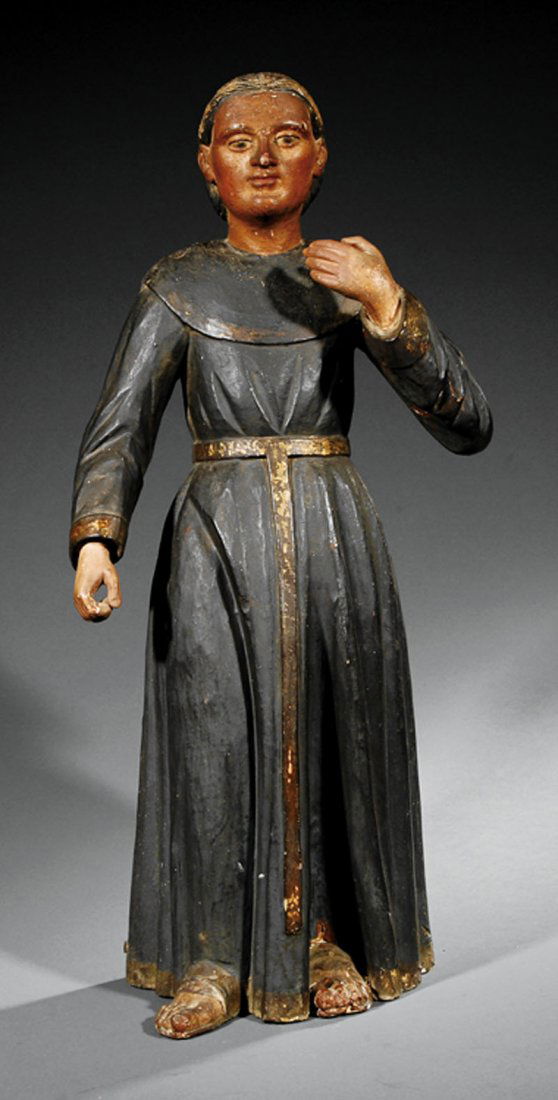 Carved Polychromed Figure "Franciscan Saint": A Carved and Polychromed Figure of a Franciscan Saint, in the Spanish Colonial manner, depicted standing in full robe and sandled feet, height 32 3/8 in