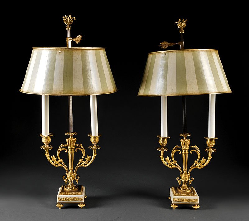 Pair of French Gilt Bronze Bouillotte Lamps: A Pair of French Gilt Bronze Bouillotte Lamps, central standard modeled as a quiver holding arrows, tole peinte shade, scrolling acanthine candle arms issuing swagged candle cups, square white marble