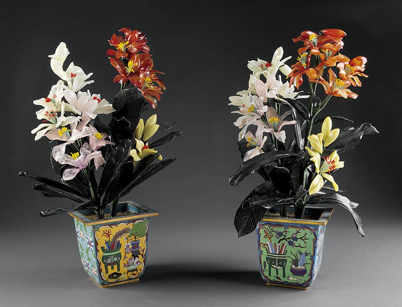Pair of Chinese Hardstone Trees: A Pair of Chinese Hardstone Trees, naturalistic fabric wrapped branches issuing colorful jade, quartz, serpentine and carnelian flowers and leaves, set in cloisonne enamel pots, approximate height 21 