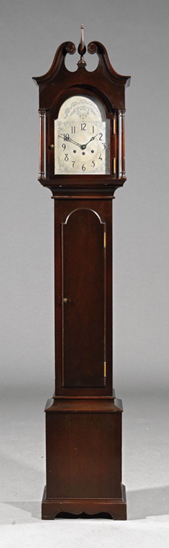 An American Carved Mahogany Clock: An American Carved Mahogany Clock, c. 1928, by Herschede, Cincinnati, OH, "Pendulum Model 10", with serial # 76995, with Westminster and Canterbury chimes striking on "Herschede Symphony Rods", height