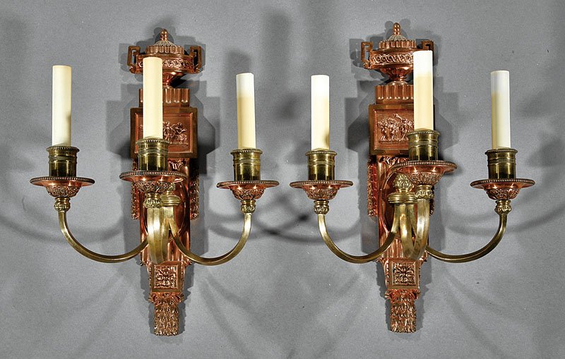A Pair of Neoclassical-Style Brass and Copper Sconces: A Pair of Neoclassical-Style Brass and Copper Three-Light Sconces, c. 1900, backplate with urn, height 16 1/2 in., width 12 in., depth 7 1/2 in