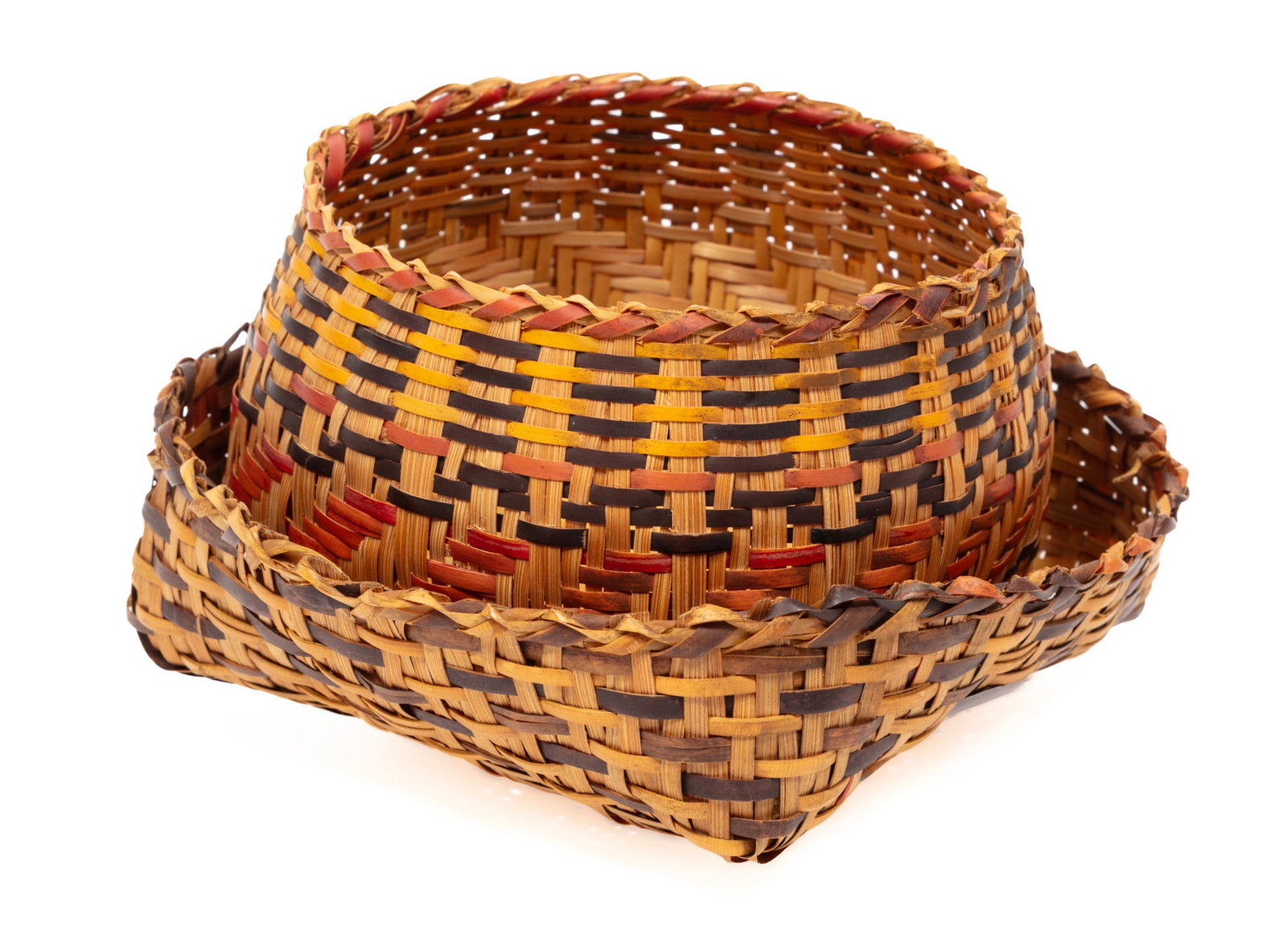 Chitimacha Single Weave Basket and a Tray: Chitimacha Single Weave Basket and a Tray natural, red, and black river cane; featuring ?Broken Plaits? pattern on tray. taller h. 3 1/2 in., w. 4 1/2 in., d. 4 1/2 in.; dimensions variable