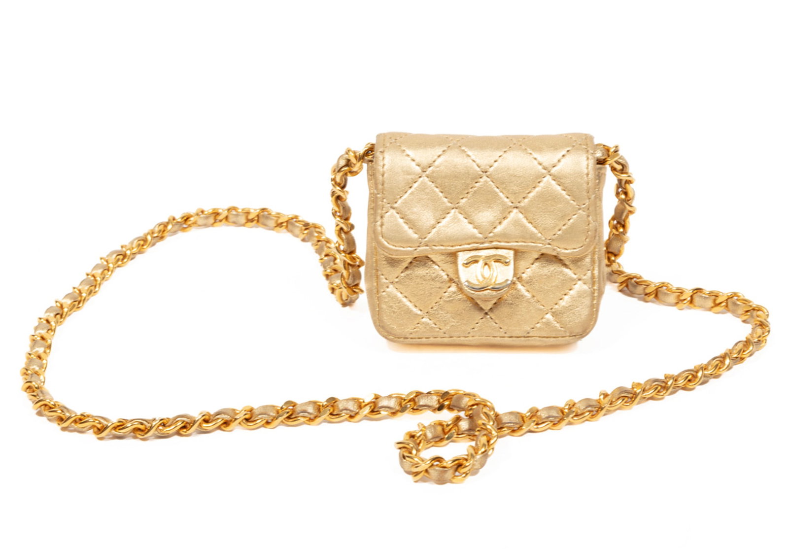 Rare Vintage Chanel Gold Lambskin Micro Classic Flap Shoulder Bag: Vintage Chanel Gold Lambskin Micro Classic Flap Shoulder Bag c. 1989-91, interior with serial number 1773253, gold-tone hardware, chain link strap, logo snap closure, h. 2 1/2 in., w. 2 3/4 in., d. 1 