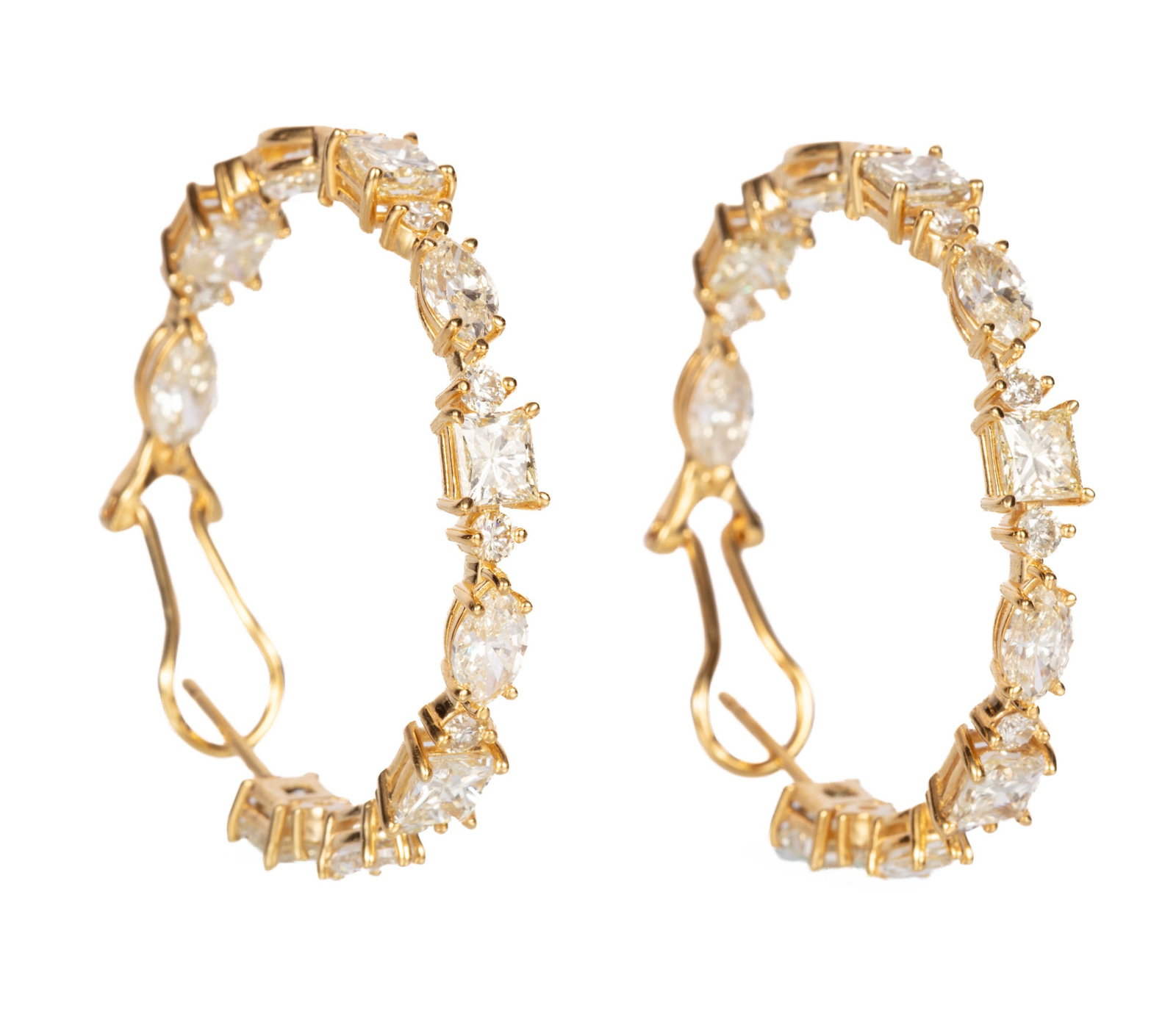 14 kt. Yellow Gold and Diamond Hoop Earrings | 8.76 tcw: Pair of 14 kt. Yellow Gold and Diamond Hoop Earrings mounted with 8.76 cts. of marquise, trianon, round and square cut diamonds; dia. 1 3/8 in.; 7.18 dwts. Please Note: Payment for all jewelry and all