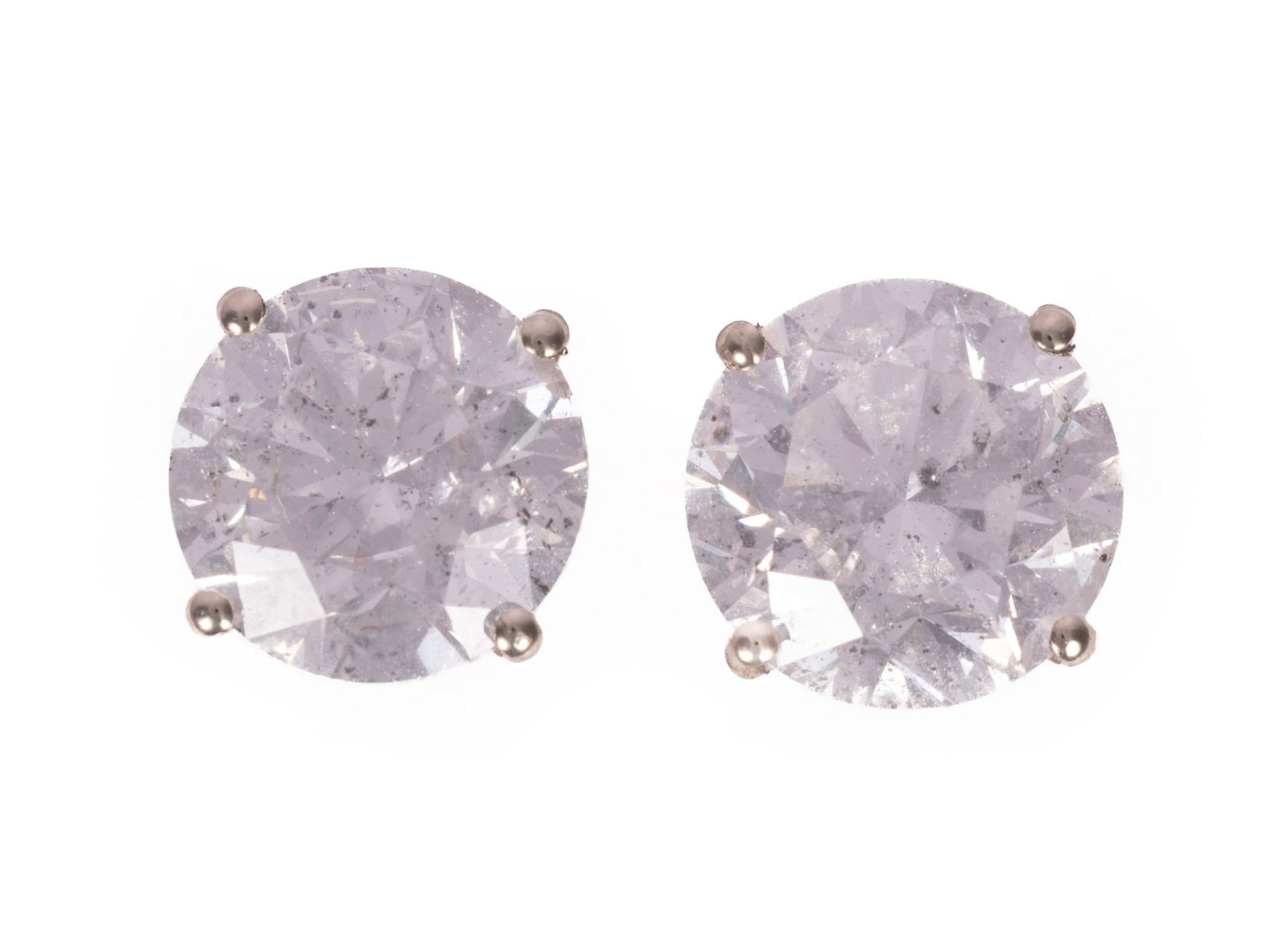 Pair of 14 kt. White Gold and Diamond Stud Earrings | 5.27 tcw: Pair of 14 kt. White Gold and Diamond Stud Earrings 2 center round brilliant cut diamonds, total wt. approx. 5.27 cts., F-G color, I1 clarity; AIGL report. Please Note: Payment for all jewelry and all