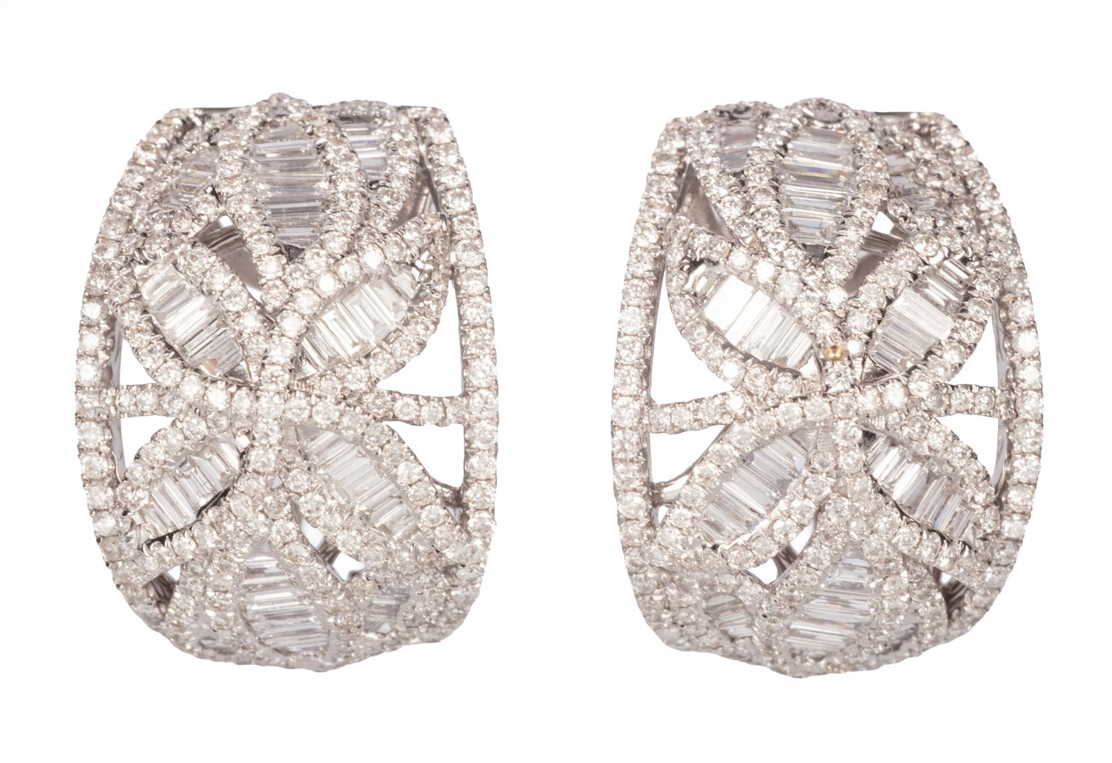 18 kt. White Gold and Diamond Earrings: Pair of 18 kt. White Gold and Diamond Earrings marked, openwork quatrefoil design mounted with baguette and round diamonds l. 3/4 in.; 8.98 dwts.
