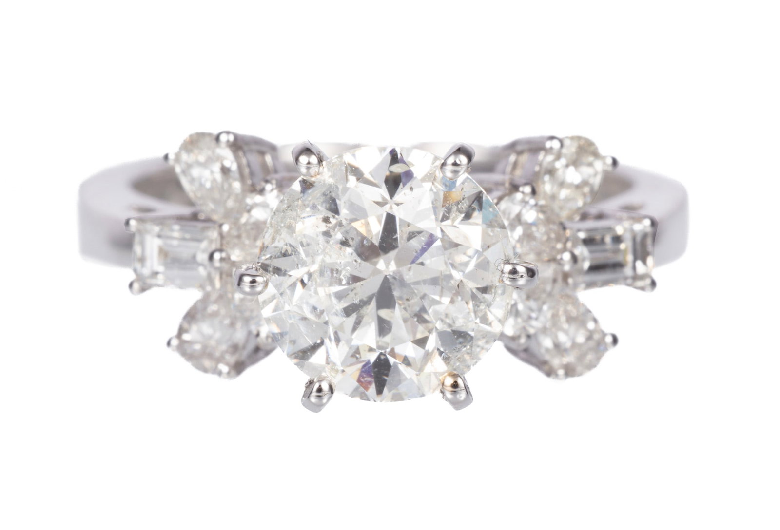 18 kt. White Gold and Diamond Ring | 3.24 tcw: 18 kt. White Gold and Diamond Ring center round brilliant cut diamond, wt. approx. 2.50 cts., H color, I1 clarity; mounted with 0.74 ct. of rectangular step cut and pear brilliant cut diamonds; size 6
