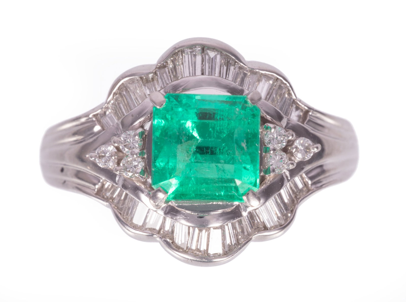 Platinum, Colombian Emerald and Diamond Ring: Platinum, Colombian Emerald and Diamond Ring center octagonal mixed cut emerald, wt. approx. 1.49 cts.; mounted with 0.60 ct. of baguette and round brilliant cut diamonds; size 5.75; GGA and GIA #6233
