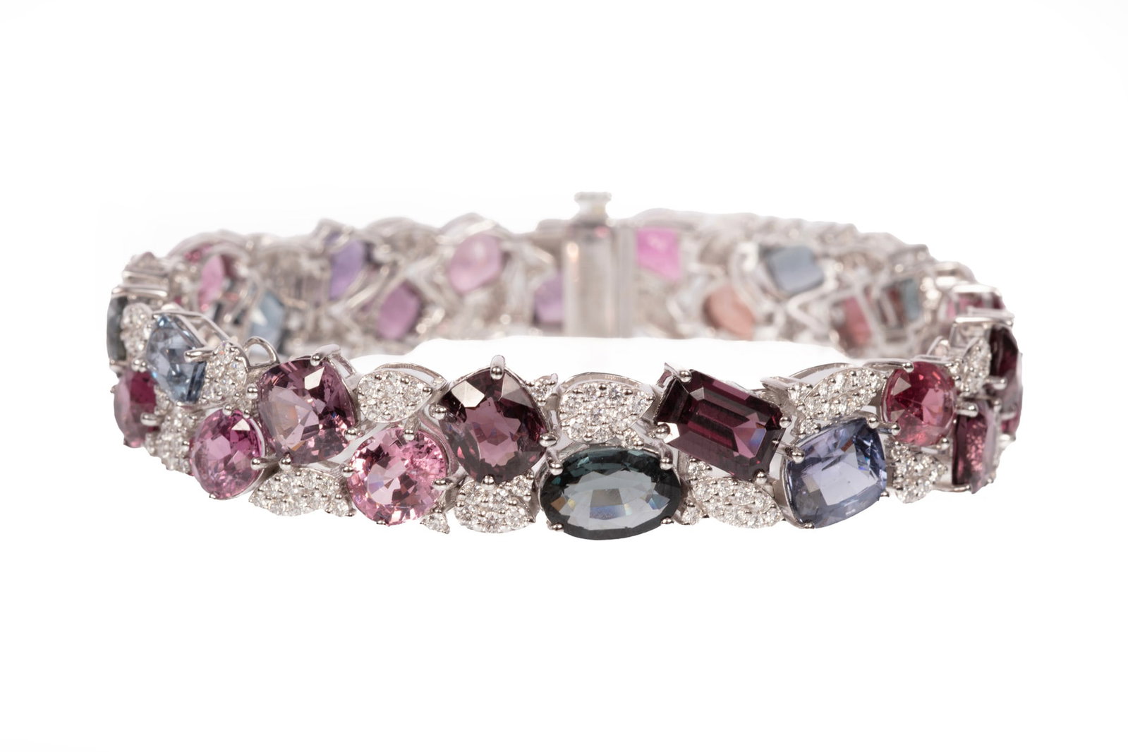 Platinum, Multicolor Sapphire and Diamond Bracelet | 37.41 sapphire tcw: Platinum, Multicolor Sapphire and Diamond Bracelet mounted with 37.41 cts. of multi faceted cut sapphires; and 2.73 cts. of round brilliant cut diamonds; l. 7 in.; GGA and GIA reports. Please Note: