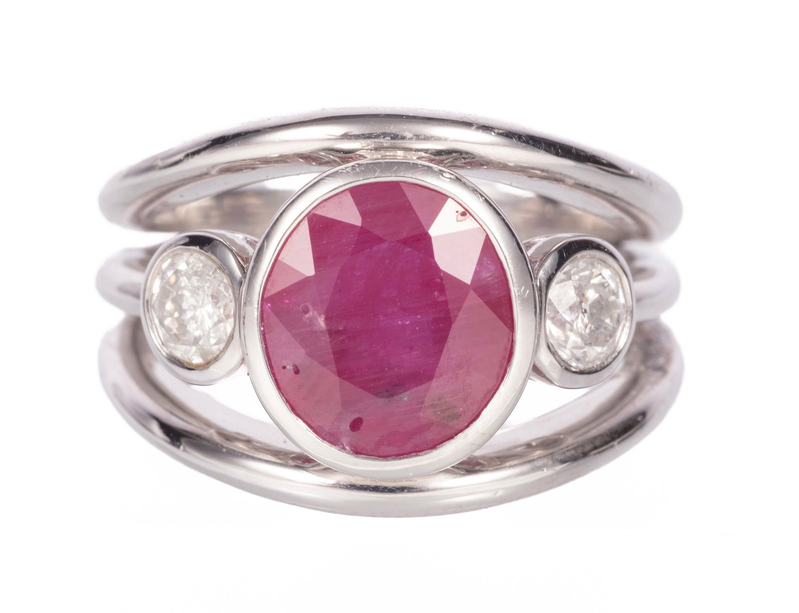 Platinum, 3.28 carat Ruby and Diamond Ring: Platinum, Ruby and Diamond Ring center oval brilliant faceted cut ruby, wt. approx. 3.28 cts.; flanked by 0.61 ct. of round brilliant cut diamonds; size 6.75; GGA report. Please Note: Payment for all