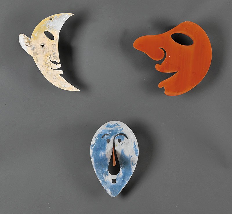 Alexander Calder (American, 1898-1976): Alexander Calder (American, 1898-1976), a suite of three wall sculptures, c. 1949, "Moon Mask", painted metal, height 14 1/2 in., width 10 in., depth 4 1/2 in.; "Red Smiling Mask", painted metal, heig