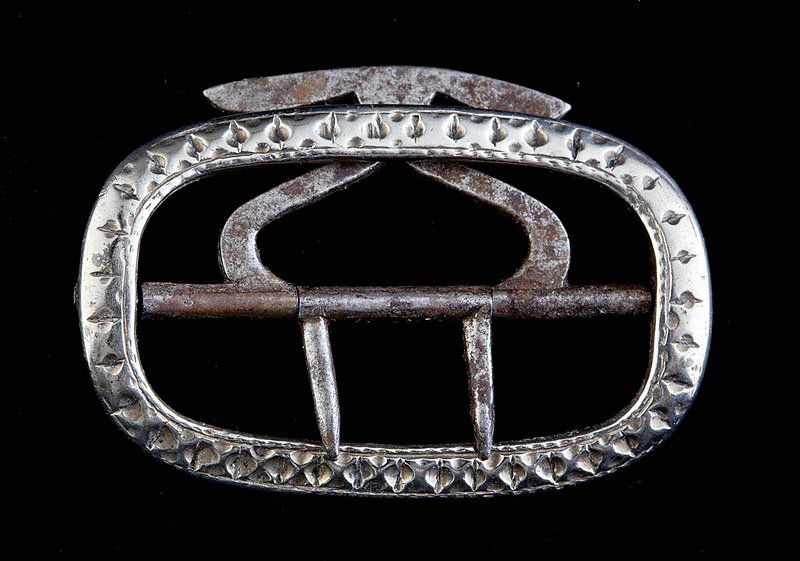 A Southern Coin Silver Buckle John Winckler: A Southern Coin Silver and Wrought Iron Buckle, probably for knee breeches, mark of John Winckler (1730-1803) or John Winckler, Jr. (1775-1854), 1 3/4 in. x 1 1/8 in Note: Silversmith John Winckler wo