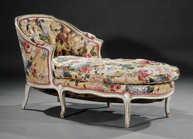 A Louis XVI-Style Creme Peinte Chaise Longue: A Louis XVI-Style Creme Peinte Chaise Longue, early 20th c., shaped rounded back, conforming foot, cabriole legs, height 30 in., width 24 in., depth 56 in