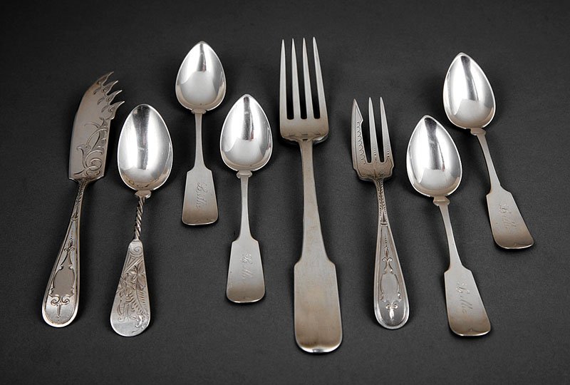 A Group of American Coin Silver Flatware: A Group of American Coin Silver Flatware, 19th c., including 4 teaspoons, Hebbard & Strong, New York, retailed by Hopkins & Co, upturned fiddle typt engraved in script "Lillie"; cheese knife and match