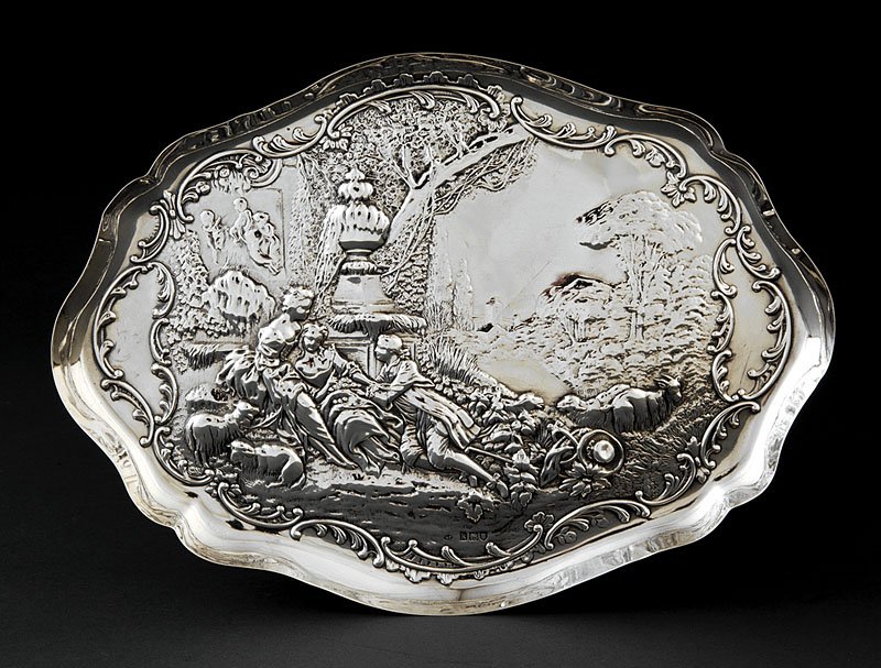 William Comyns Sterling Silver Dish: An Edwardian Sterling Silver Dish, William Comyns, London, 1905, mark ent. 1859; shaped oval chased with bucolic scene of 18th c. courtiers with sheep and goats, length 12 3/8 in., weight 10.55 troy o