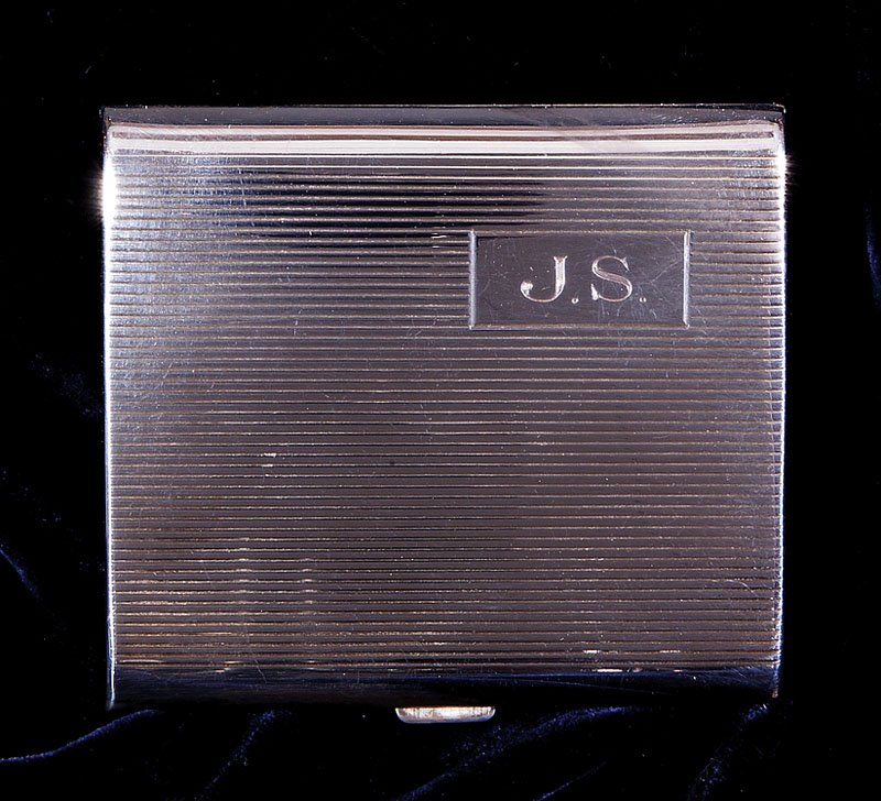 Cartier Sterling Silver Cigarette Case: A Cartier Sterling Silver Cigarette Case, ribbed engraved hinged case, monogrammed "J.S.", height 3 1/4 in., width 3 5/8 in., 103.5 dwt. Provenance: Estate of Judith Gic Shelton, New Orleans, LA