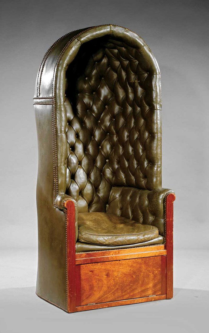 Georgian-Style Tufted Leather "Porter's Chair": A Fine Georgian-Style Tufted Leather "Porter's Chair", barrel back, shaped mahogany arms and plinth storage compartment, seat with loose cushion, green leather upholstery with nailhead trim, height 67