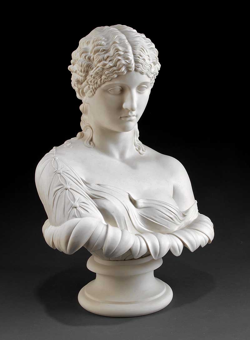 English Parian Bust of "Clytie": A Large English Parian Bust of "Clytie", mid-19th c., attributed to Copeland, depicted with loose drapery, emerging from a sunflower, after the AD 40-50 Roman bust conserved at the British Museum, soc