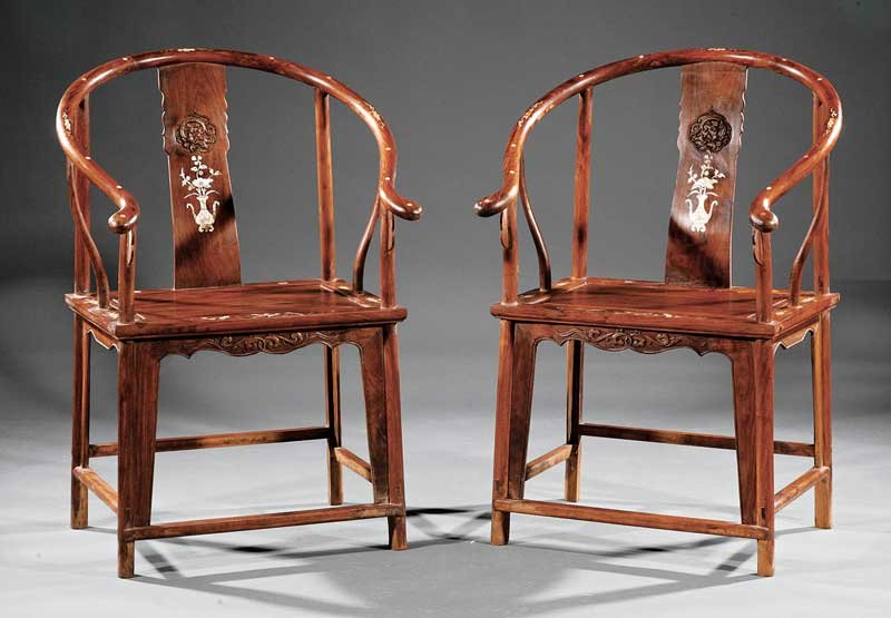 Chinese Mother-of-Pearl Inlaid Armchairs: A Pair of Chinese Mother-of-Pearl Inlaid Horseshoe Back Armchairs, probably 20th c., curved crestrails above carved scrolled splats, solid panel seats, shaped aprons, flange brackets, box stretchers .