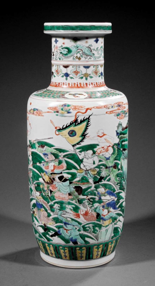 A Chinese Famille Verte Porcelain Rouleau Vase: A Chinese Famille Verte Porcelain Rouleau Vase, probably Qing Dynasty (1644-1911), enameled with a scene of Nezha battling the East Sea Dragon, base with double circle mark, height 18 in