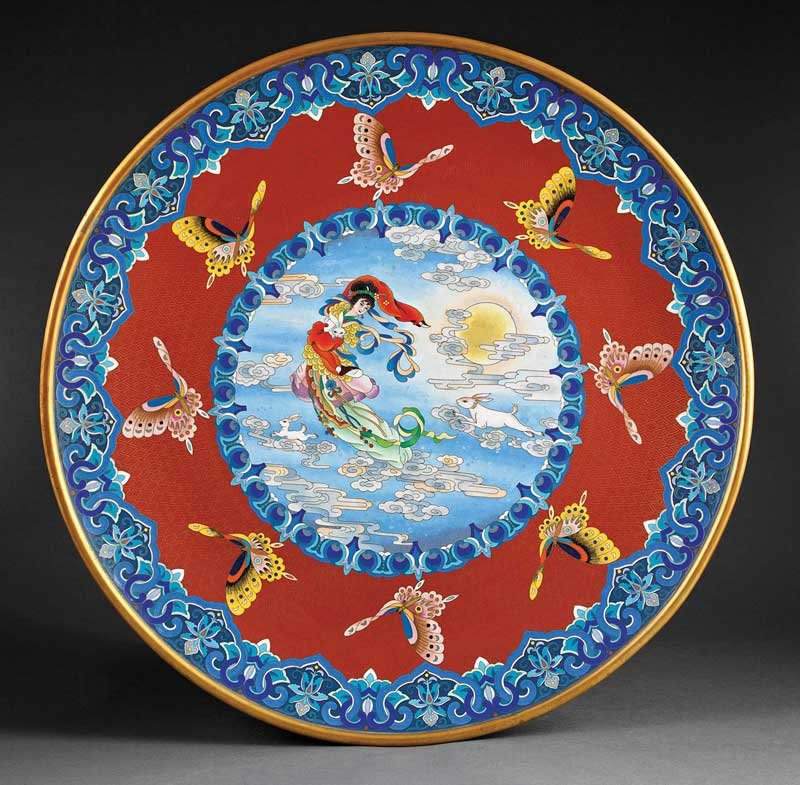 A Monumental Chinese Cloisonne Enamel Charger: A Monumental Chinese Cloisonne Enamel Charger, probably 20th c., enameled with Chang-e, the Goddess of the Moon, in clouds with rabbits, bordered by butterflies and ruyi heads, height 3 in., diameter 