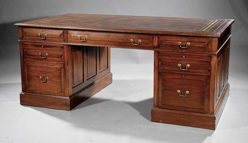 Frank Livaudais Mahogany Partners' Desk: A George III-Style Mahogany Partners' Desk, Frank Livaudais, New Orleans, signed, inset tooled leather top, frieze drawers, each pedestal fitted with writing slide and drawers, height 30 1/2 in., widt