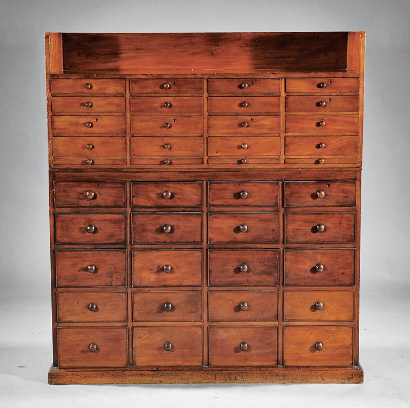 Mahogany Specimen or Apothecary Cabinet: A William IV Mahogany Specimen or Apothecary Cabinet, c. 1830, in two parts, galleried top above a series of graduated drawers, medial pull out trays, molded base, height 54 in., width 47 1/2 in., dep