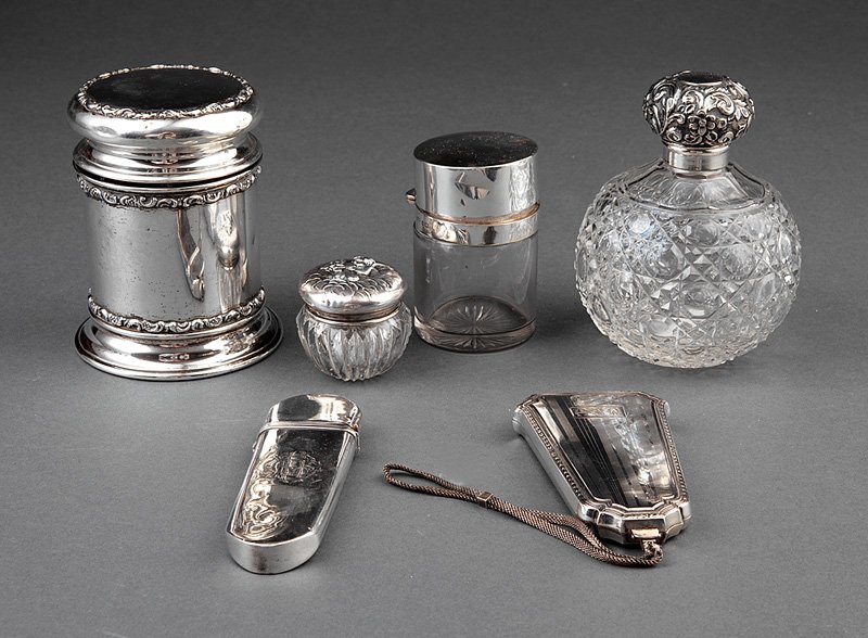 American and English Dressing Table Accoutrements: A Group of American and English Dressing Table Accoutrements, late 19th/early 20th c., including a lidded powder jar, Mauser, NY, 1887-1903, height 4 3/4 in.; a pressed glass scent bottle with silver 