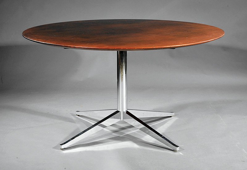 Florence Knoll Mid-Century Walnut, Chrome Table: A Florence Knoll Mid-Century Modern Walnut and Chrome Table, with Knoll International label, round walnut top with beveled edge, over a heavy chromed-steel pedestal base, height 28 in., diameter 54 in