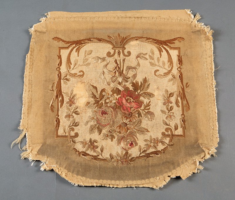 Aubusson Silk and Wool Tapestry Chair Seat Cover: A French Aubusson Silk and Wool Tapestry Chair Seat Cover, 19th c., olive ground reserved with floral bouquet, overall length 21 in., width 21 in