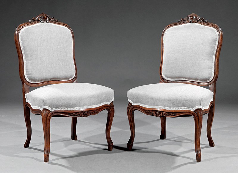 A Pair of Louis XV-Style Carved Walnut Chaises: A Pair of Louis XV-Style Carved Walnut Chaises, 19th c., en suite with preceding lots