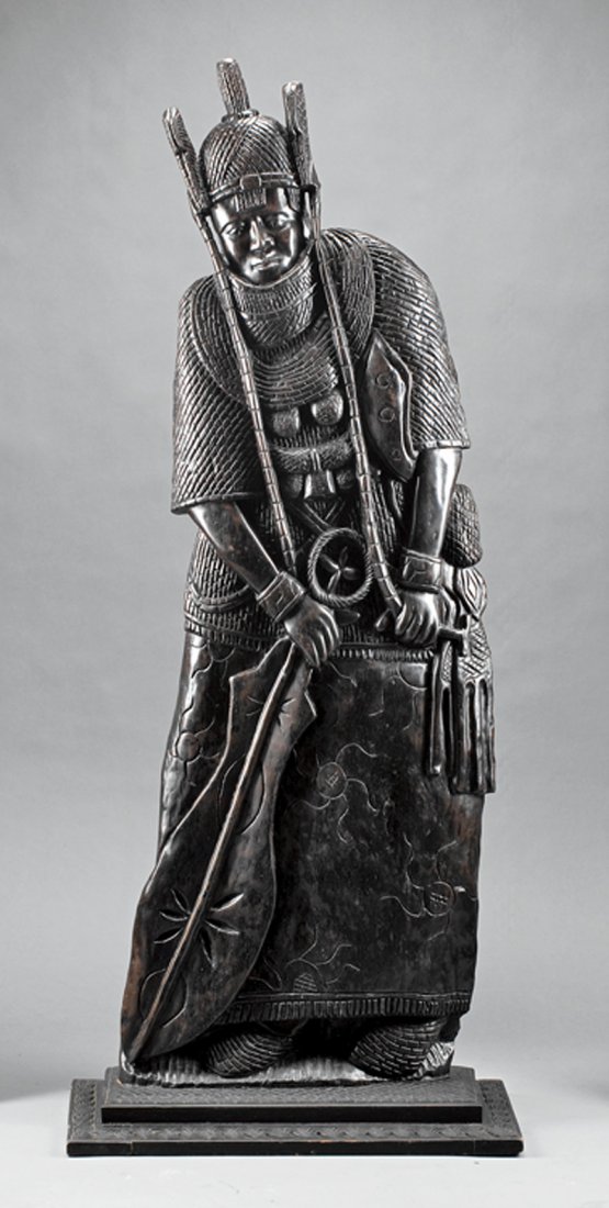 A Life-Size Asian Ebonized Carved Wood Figure: A Life-Size Asian Ebonized Carved Wood Figure, standing male figure carved in full armor, height 72 1/2 in., width 30 1/2 in., depth 15 in