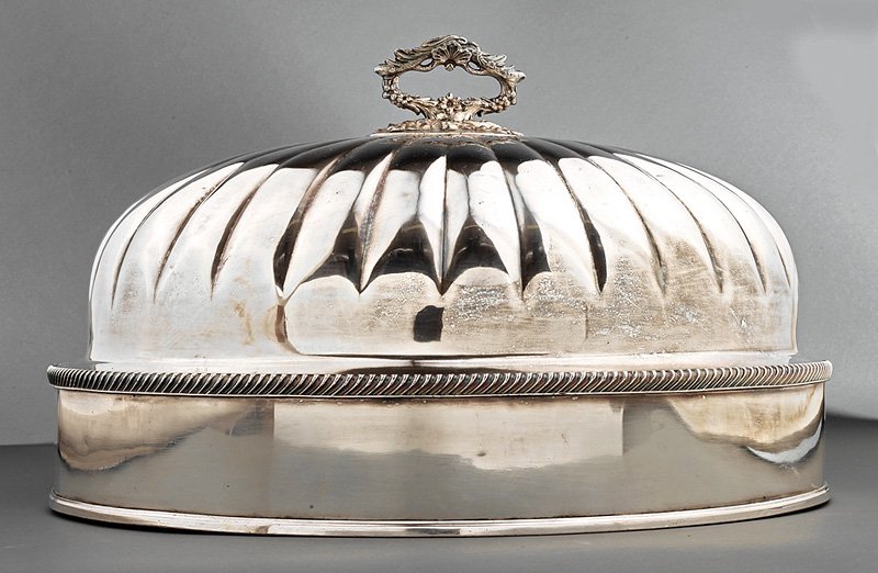 A Georgian Sheffield Plate Venison Dome: A Georgian Sheffield Plate Venison Dome, c. 1800, with floral scroll handle, lobed body, gadrooned collar and original tinned back, height 12 in., width 18 in., depth 14 1/2 in