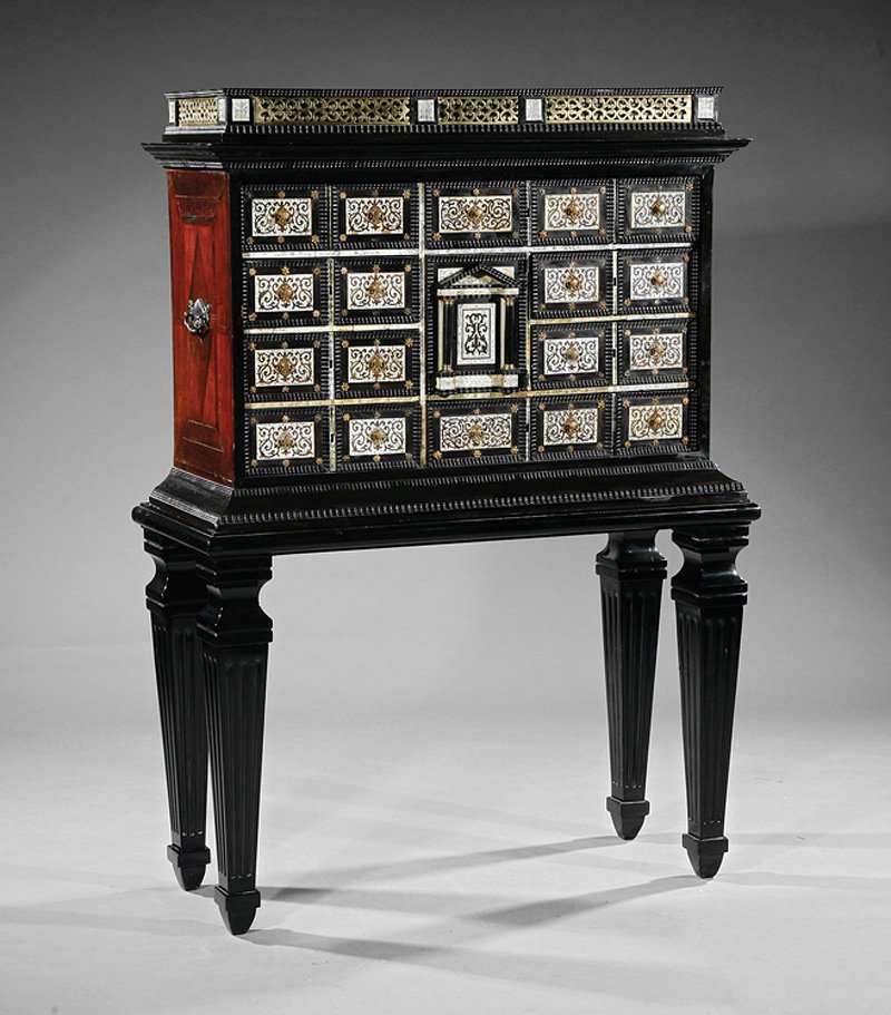Ebonized, Inlaid Brass-Mounted Vargueño and Stand: An Antique Continental Ebonized, Inlaid and Brass-Mounted Vargueño and Stand, late 18th/early 19th c., probably Portuguese, brass fretwork pediment, molded cornice over a configuration of short drawe