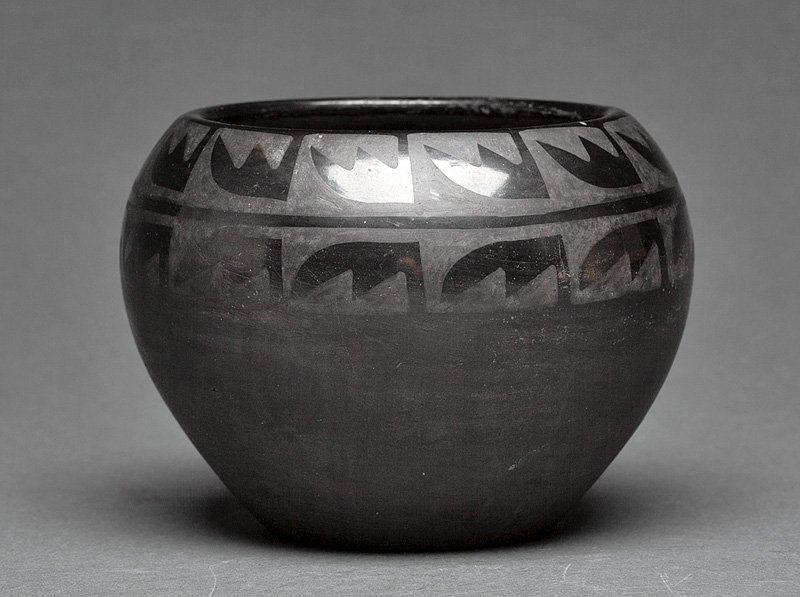 A San Ildefonso Black Pottery Vase: A San Ildefonso Black Pottery Vase, 20th c., by Maria and Julian Martinez, signed in sgraffito "Marie/Julian", height 4 1/4 in., diameter 5 1/2 in