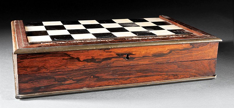 An English Rosewood Gaming Box: An English Rosewood Gaming Box, 19th c., fitted for checkers and backgammon, tooled green leather interior, with matching dice rollers, folded height 4 1/4 in., width 18 1/4 in., depth 10 3/4 in