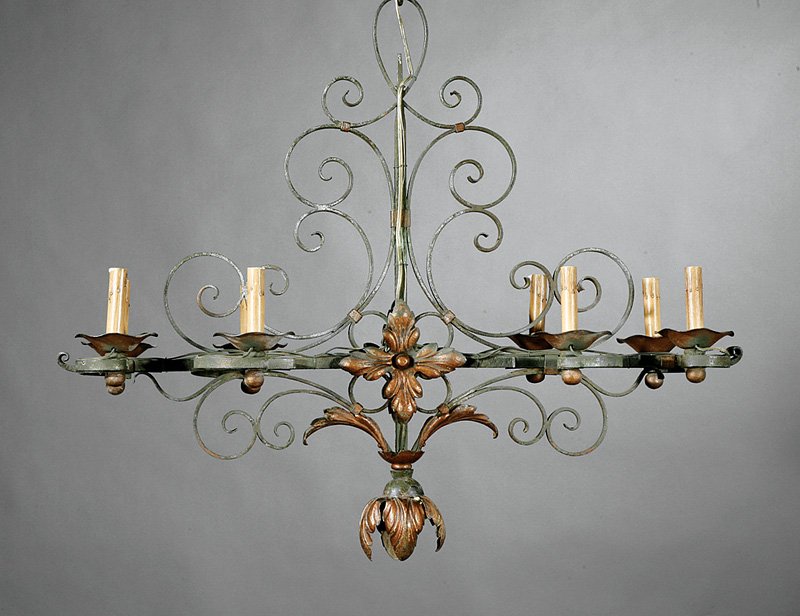 Wrought Iron and Tole Eight-Light Chandelier: A French Wrought Iron and Tole Eight-Light Chandelier, c. 1920, scrolled body, floriform bobeches, bud pendant, verdigris with gilt accents, electrified, height 29 in., width 35 in., depth 14 in