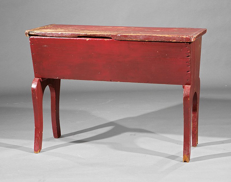 An American Painted Pine Dough Box: An Antique American Painted Pine Dough Box, 19th c., lid lifting to a canted well on shaped legs, height 29 1/4 in., width 40 3/4 in., depth 18 3/4 in.