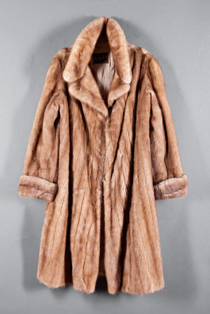 A Sable Mink Coat: A Sable Mink Coat, notched lapels, two on-seam pockets, lined in brown silk, labeled "Dempster's", back length approx. 41 in., approx. size 4-6
