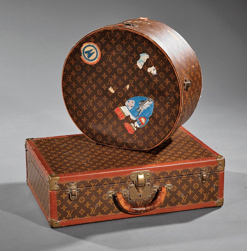Louis Vuitton Monogram Canvas Suitcase & Hat Box: A Vintage Louis Vuitton Monogram Canvas Suitcase and Hat Box, gold label on interior marked "Louis Vuitton Ave Marceau 78 bis Paris" on both, hat box retains some original French travel stamps and wor
