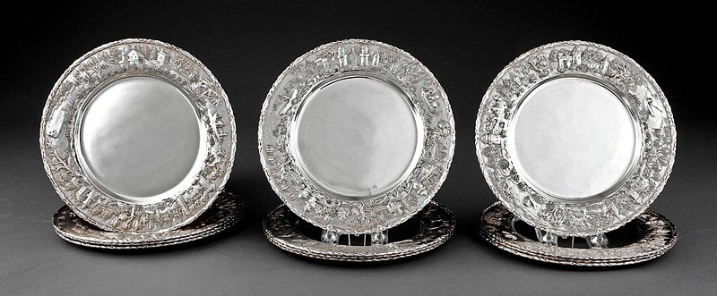 Kirk Sterling Silver Repousse Luncheon Plates: A Set of Twelve Kirk Sterling Silver Repousse Luncheon Plates, S. Kirk & Son Co., 1896-1924, border with chased landscape decoration, diameter 9 in., weight 150.50 troy ozs